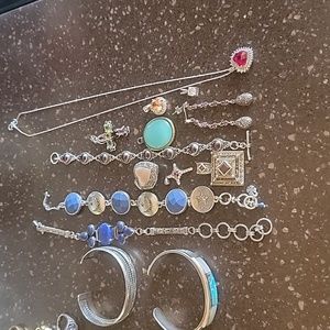 Lot of misc sterling silver bracelets and charms